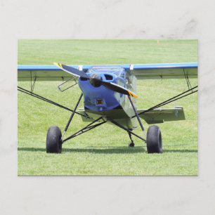 Small Airplane Parked On The Grass Postcard