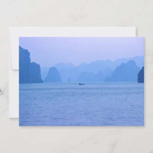 Small fishing boat in Ha Long Bay _ Vietnam Asia Invitation