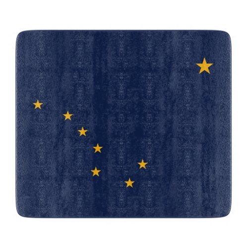 Small glass cutting board with flag of Alaska