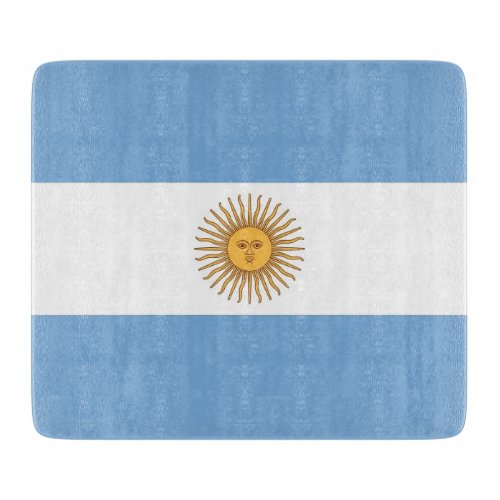 Small glass cutting board with flag of Argentina