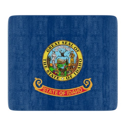 Small glass cutting board with flag of Idaho
