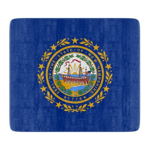 Small glass cutting board with New Hampshire flag