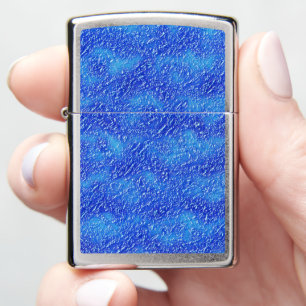 Small grooves texture on stained blue to clear hue zippo lighter