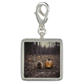 Small groundhog with jack-o-lantern charm