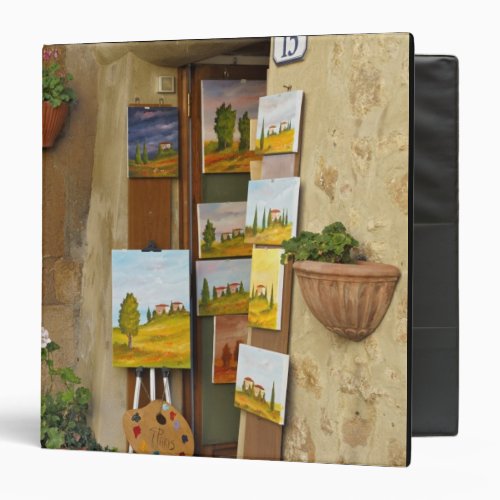 Small shope with artwork for sale on sidewalk 3 ring binder