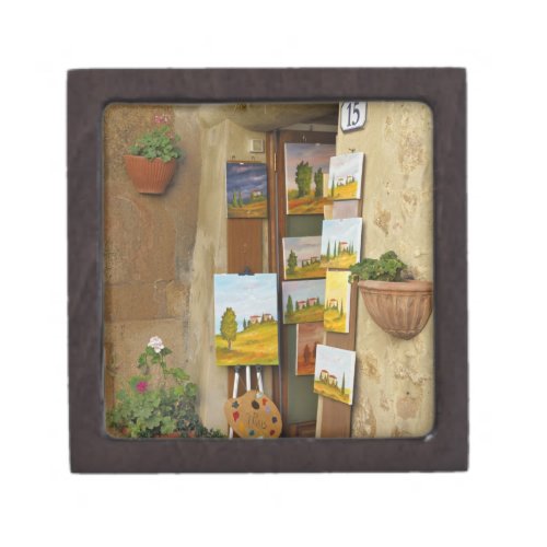 Small shope with artwork for sale on sidewalk jewelry box