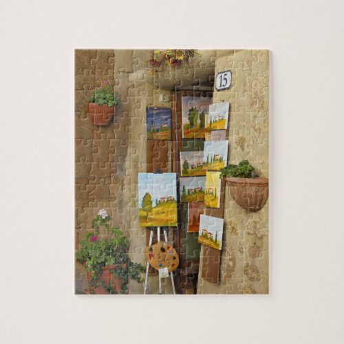 Small shope with artwork for sale on sidewalk jigsaw puzzle