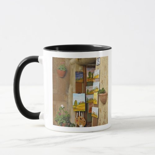 Small shope with artwork for sale on sidewalk mug