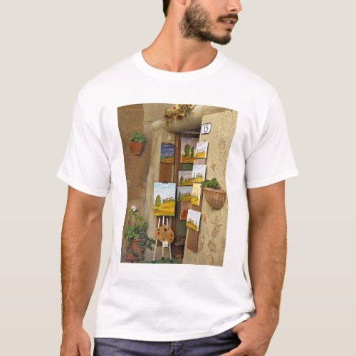 Small shope with artwork for sale on sidewalk T_Shirt