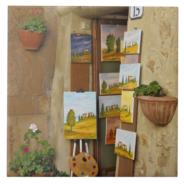 Small shope with artwork for sale on sidewalk tile (Front)