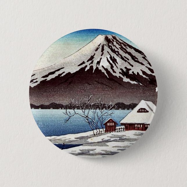 Small snow covered building on the coast pinback button (Front)