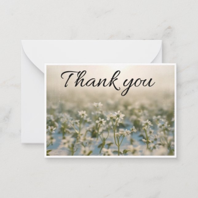 small white flower scattered across thank you card (Front)
