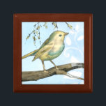 Small Yellow Bird Perched on a Branch Looking up Keepsake Box<br><div class="desc">This painting is perfect for your bird collection. The small yellow bird and blue pastel background of this image are simple yet soothing and could be easily added to any Zazzle product offered. Choose this artprint today.</div>