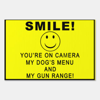 SMILE! No tresspassing sign