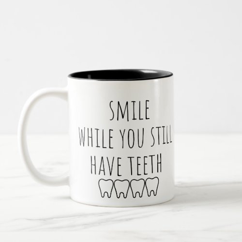 smile while you still have teeth Two_Tone coffee mug