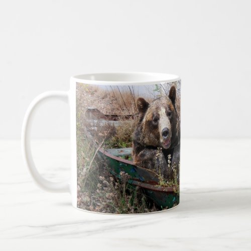 smiling bear in row boat coffee mug