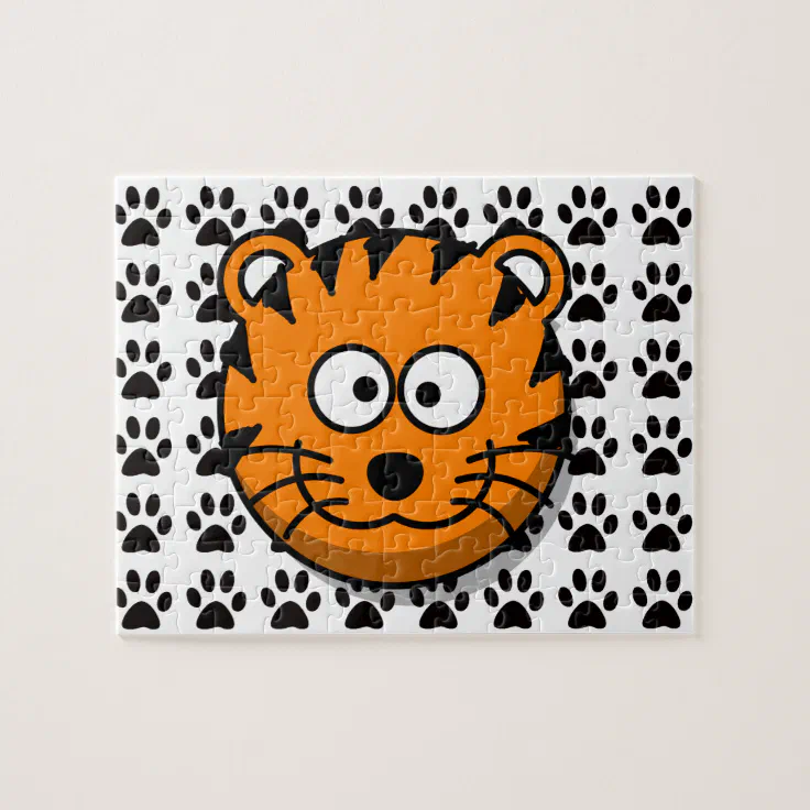 Smiling Cartoon Tiger with Paw Print Background Jigsaw Puzzle | Zazzle