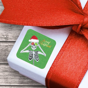 Smiling Christmas Skeleton Ornament Eyes on Green Square Sticker