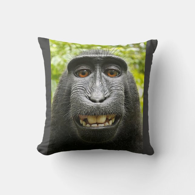 Smiling Crested Macaque Throw Pillow (Front)