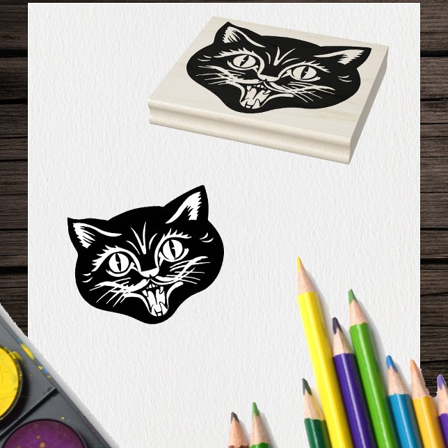 Smiling Face Head of Vintage Halloween Cat Rubber Stamp (Smiling face of Vintage Halloween cat with fangs on craft rubber stamp.)
