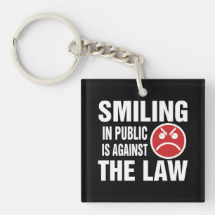 Smiling in Public is Against the Law Keychain