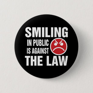 Smiling in Public is Against the Law Pinback Button