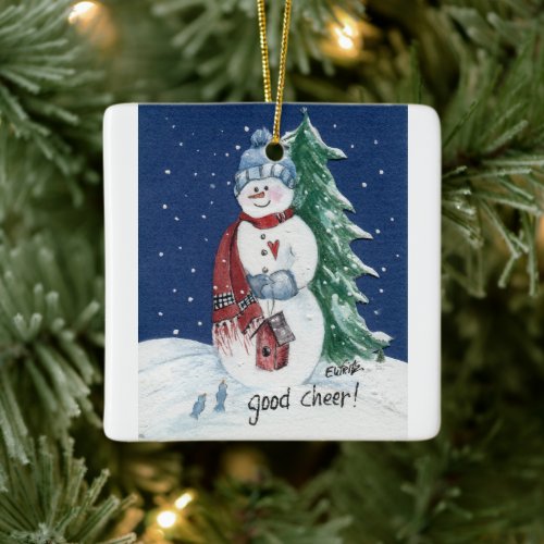 Smiling Snowman Holds Birdhouse Painting  Ceramic Ornament