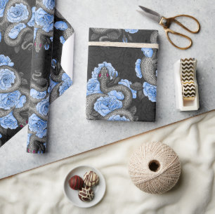 Snakes and blue roses wrapping paper