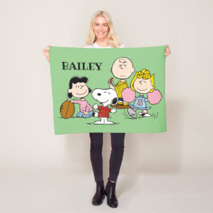 Snoopy and the Gang Play Football Fleece Blanket