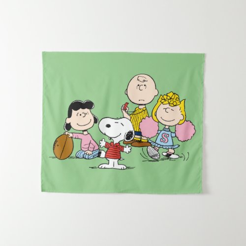 Snoopy and the Gang Play Football Tapestry
