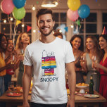 Snoopy | Rainbow Dog House Tri-Blend Shirt<br><div class="desc">Brighten your wardrobe with this delightful Snoopy t-shirt featuring Snoopy lounging on his iconic doghouse with a vibrant rainbow design. Perfect for Peanuts fans,  this playful and colorful shirt adds a cheerful touch to any casual outfit,  celebrating the timeless charm of Snoopy and his carefree spirit.</div>