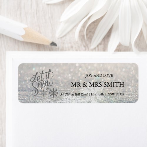 Snow background of silver snowflakes label