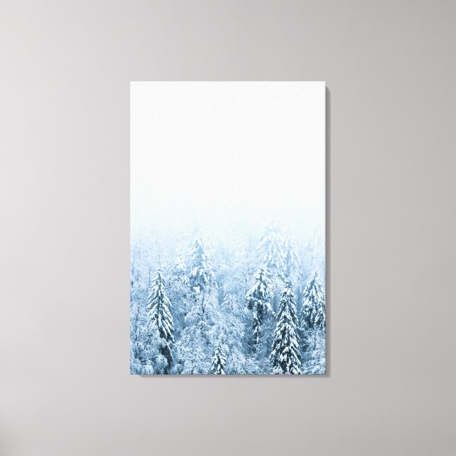 Snow covered beech spruce forest in fog canvas print (Front)