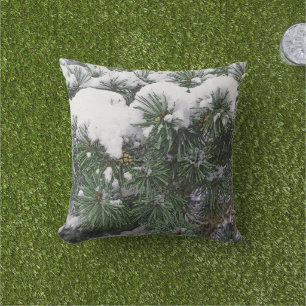 SNOW-COVERED EVERGREEN BOUGHS WITH PINE CONE THROW PILLOW