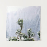 SNOW COVERED GREEN LEAF TREE