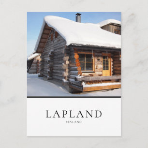 Snow-covered log cabin in Lapland, Finland Postcard