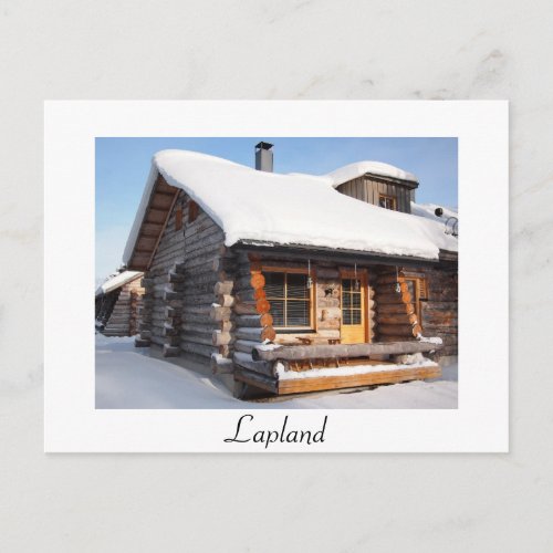 Snow_covered log cabin in Lapland white postcard