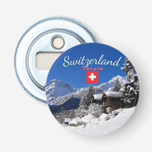 Snow-covered log cabins in Switzerland Bottle Opener