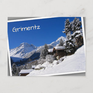 Snow-covered log cabins in Switzerland Postcard