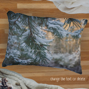 Snow-covered pine branches accent pillow