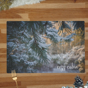 Snow-covered pine branches placemat
