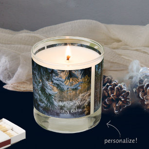 Snow-covered pine branches scented candle