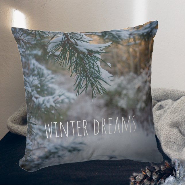 Snow-covered pine branches throw pillow (Creator Uploaded)
