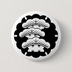 Snow-covered three-tiered pine in rice cake pinback button