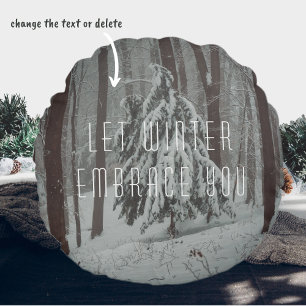 Snow-covered trees in the misty winter forest round pillow