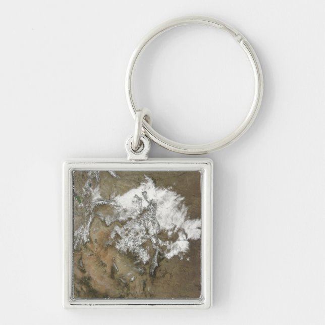 Snow covers the Rocky Mountains in United State Keychain (Front)