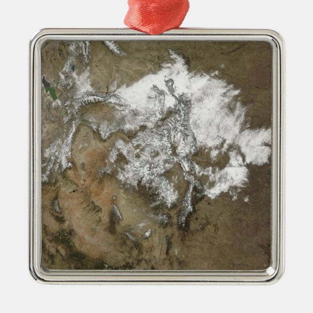 Snow covers the Rocky Mountains in United State Metal Ornament (Front)