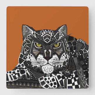 snow leopard orange square wall clock