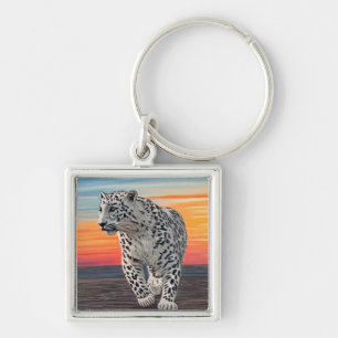 Snow Leopard Walking on the Beach During a Sunset Keychain