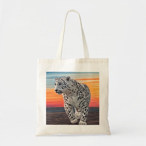 Snow Leopard Walking on the Beach During a Sunset Tote Bag